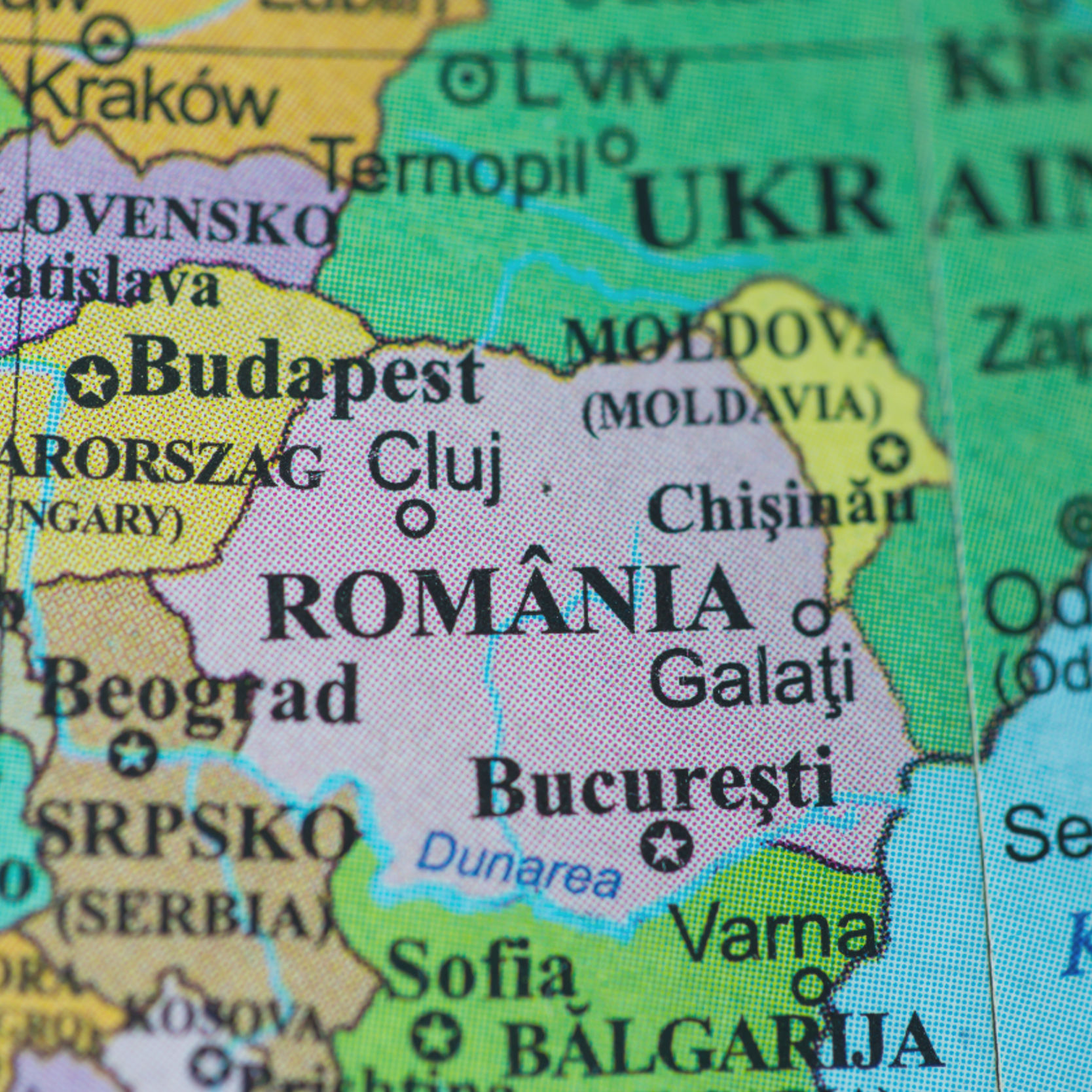 Map view of Romania on a geographical globe