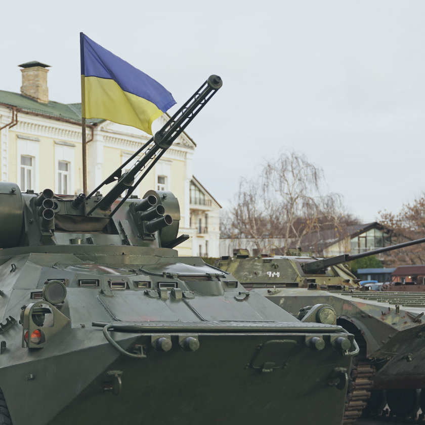 Troop carrier and tank with Ukrainian flag