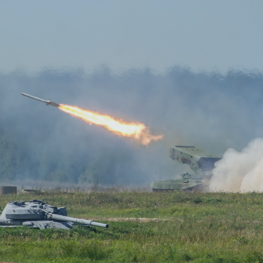 Military rocket launch in the woods, war bullet attack