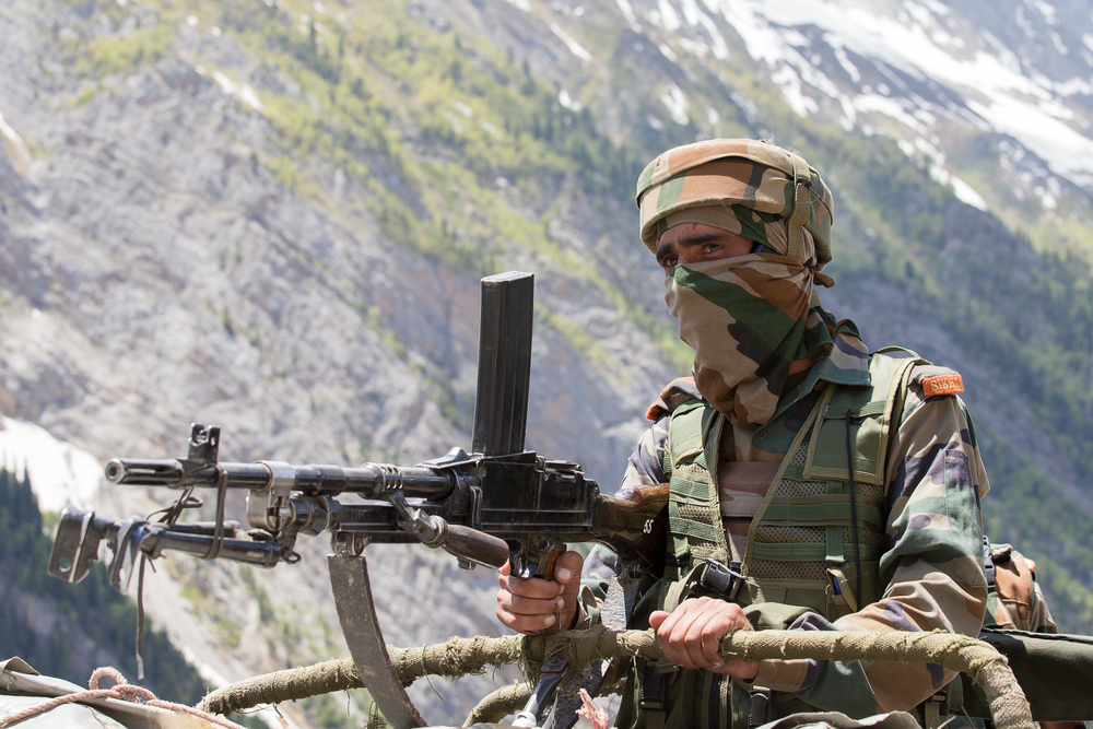 JAMMU AND KASHMIR, INDIA - JUNE 12, 2015 : Unknown Indian frontier guard. Indian Army checkpoint in Kashmir Himalayas.