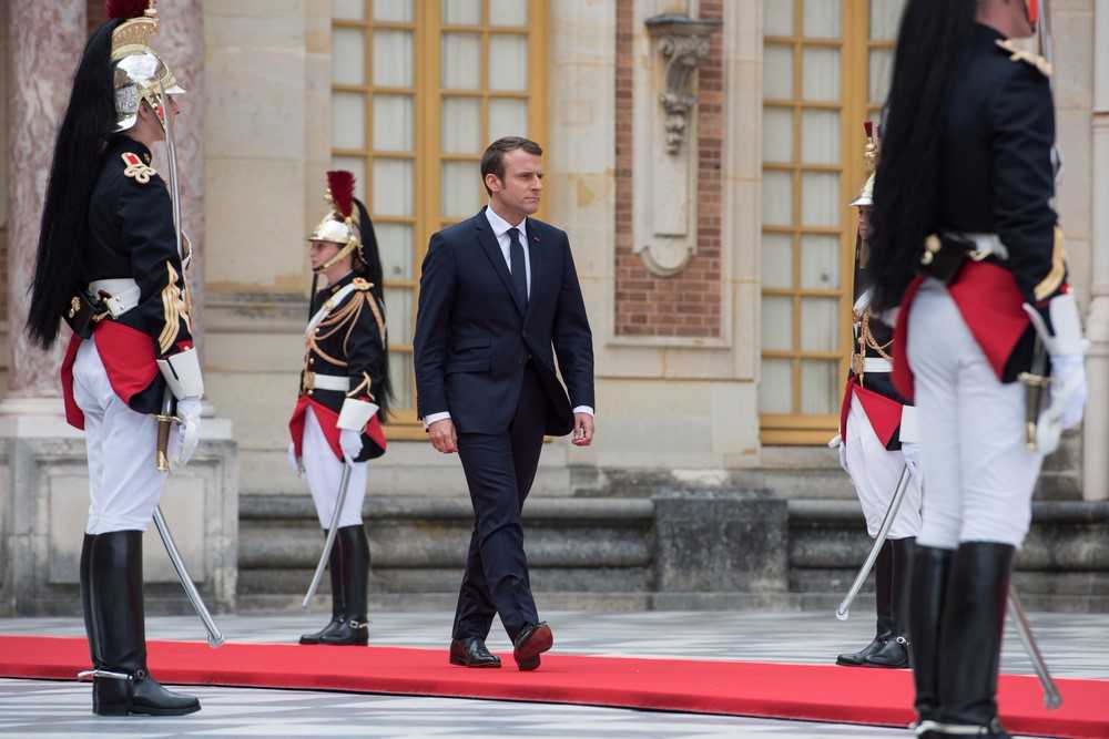 PARIS, FRANCE - MAY 29, 2017 : President of France Emmanuel Macron in marble courtyard at the Palace of Versailles