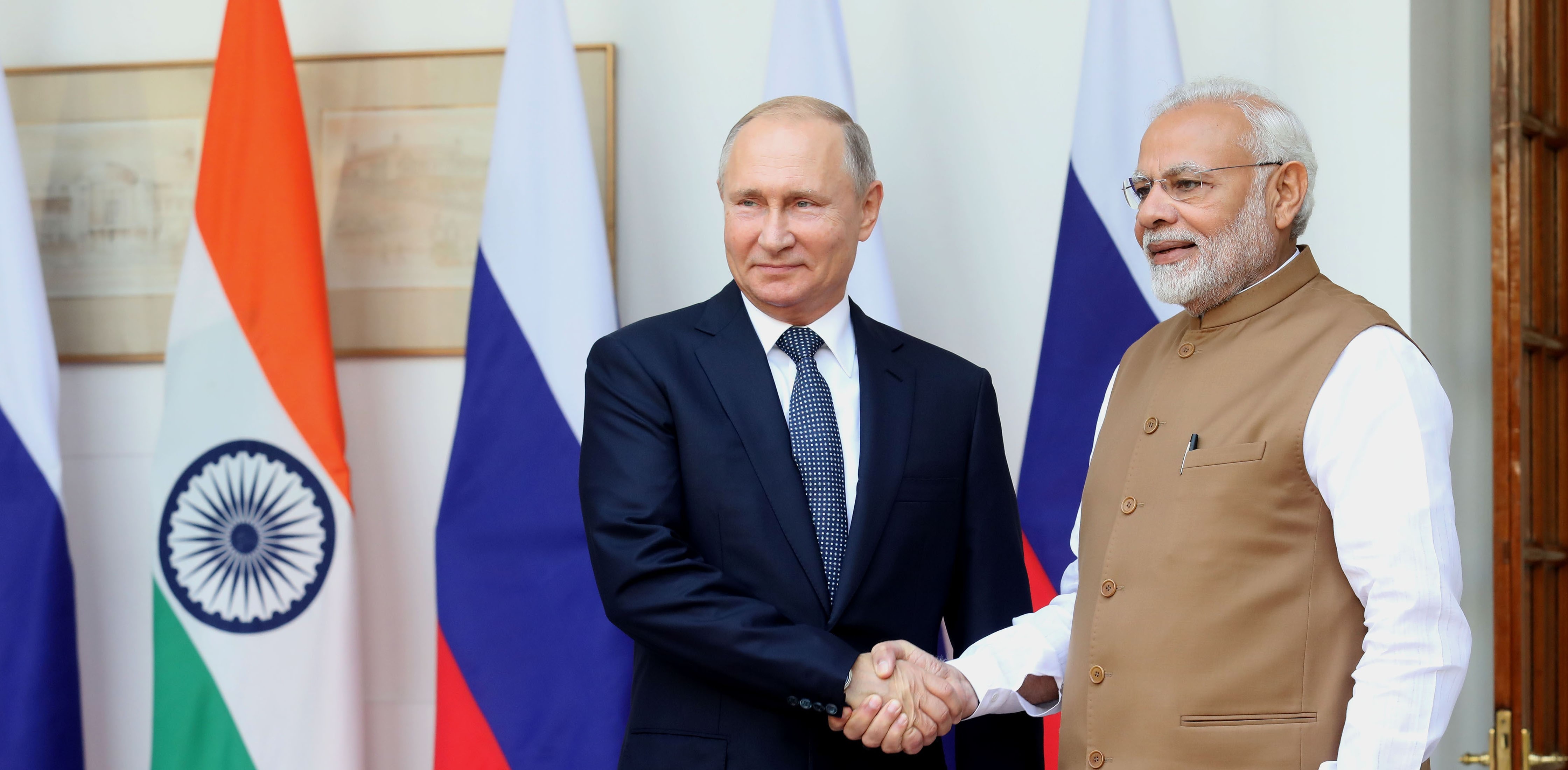 New Delhi, India June 20, 2020: Indian Prime Minister Narendra Modi's hugs Russian President Vladimir Putin before a meeting at Hyderabad House. sign a $5 billion deal to buy Russian S-400 air defense