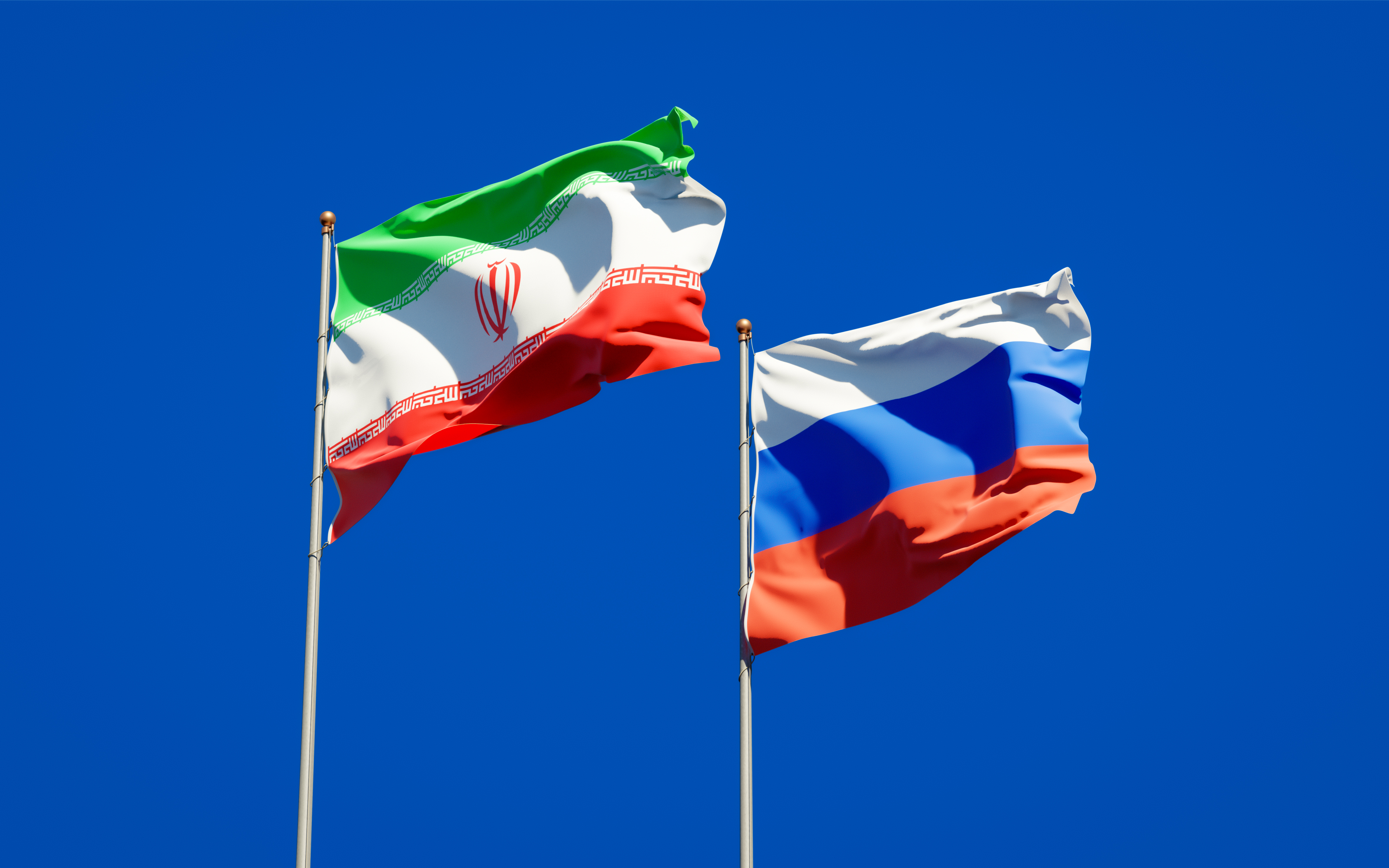 Iranian and Russian flags.