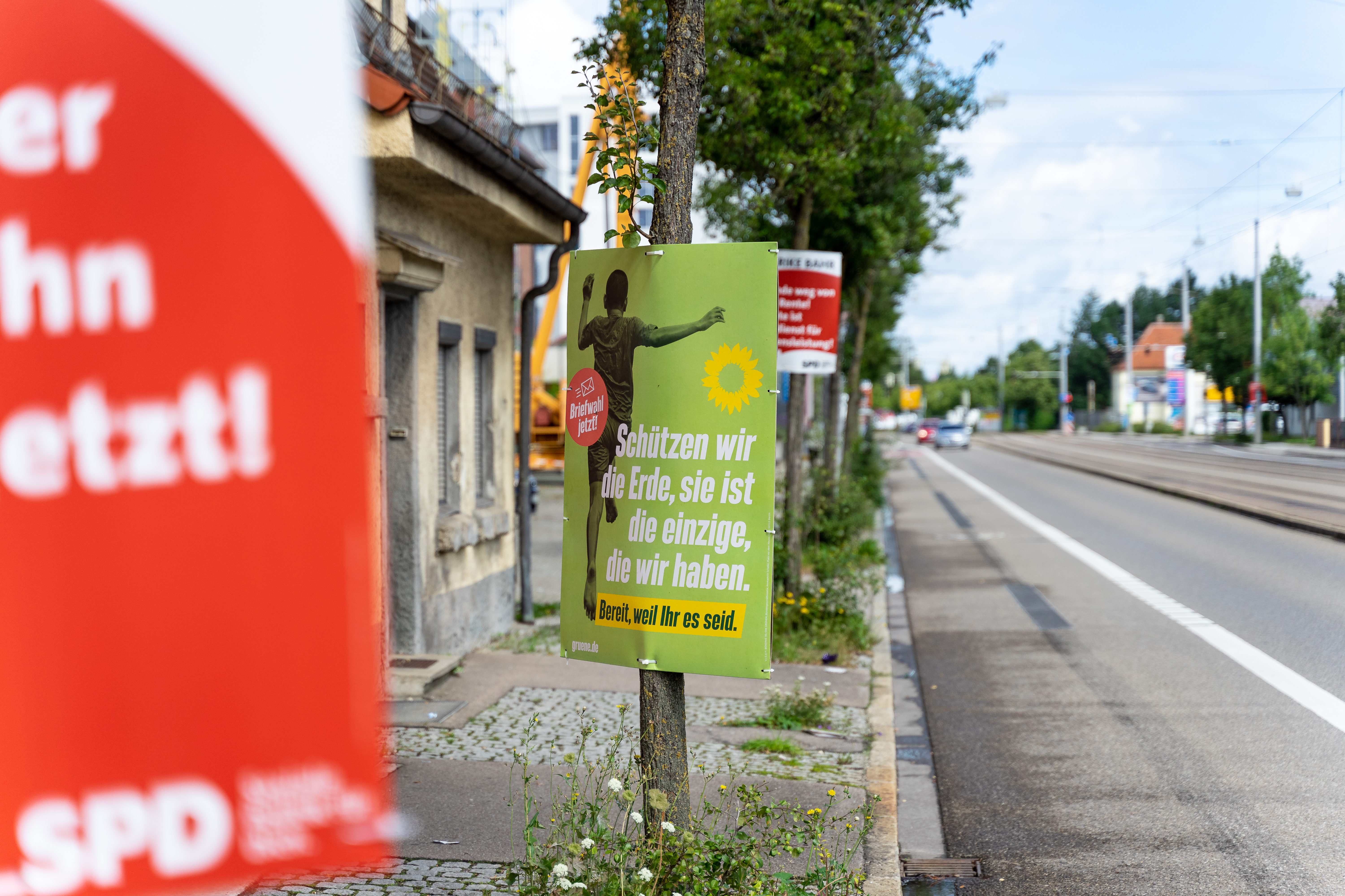 Political posters with campaign slogan from the party “Die Grünen”, Augsburg, Bavaria, Germany - August 6, 2021