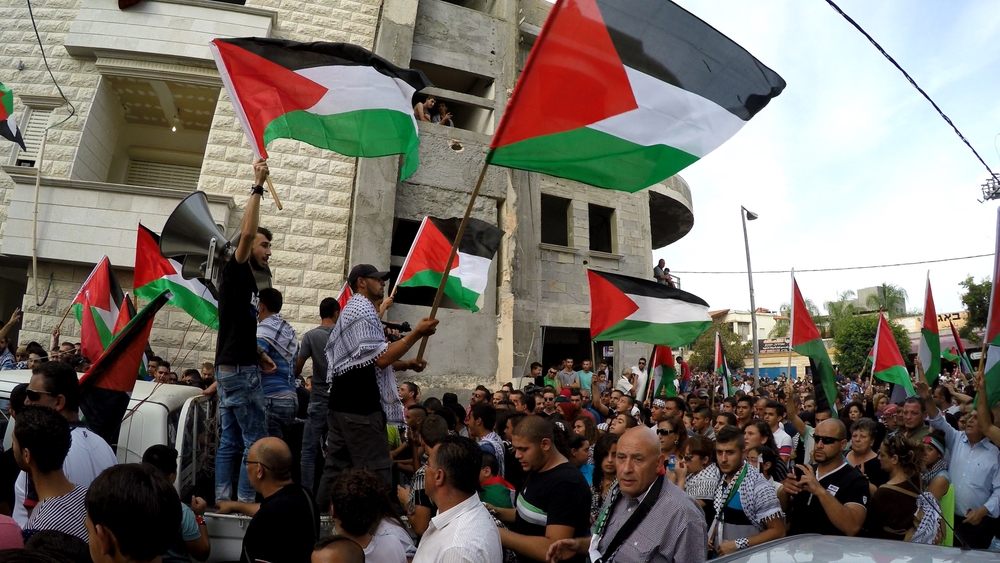 MK Member of Knesset Basel Ghattas attends anti Israel protest with PLO flags, demand liberation of Al Aqsa mosque and occupied territories, solidarity with Palestinians