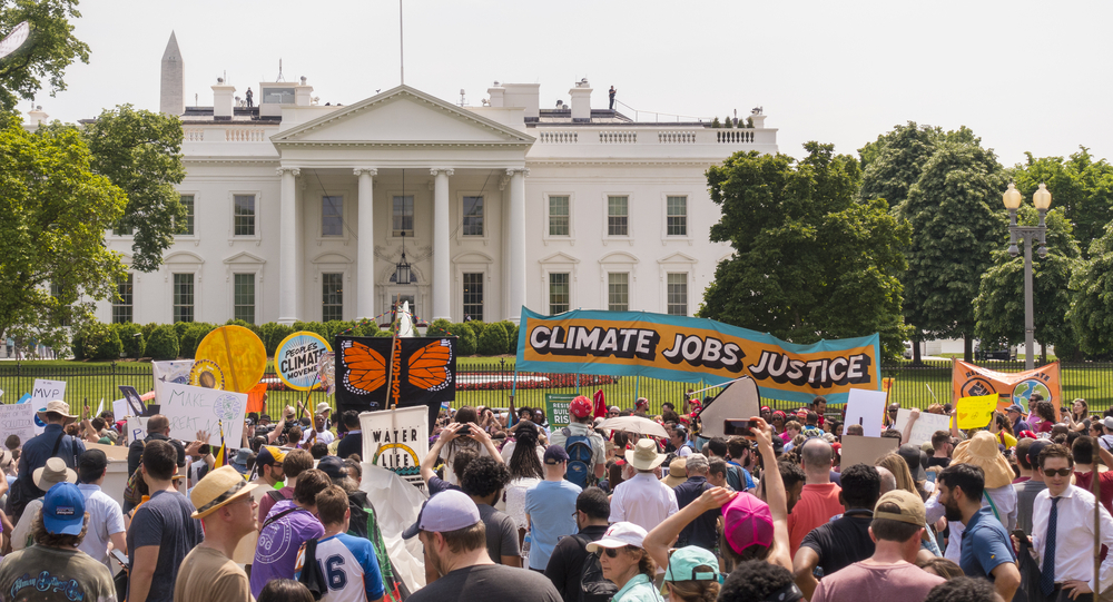 WASHINGTON, DC, USA - APRIL 29, 2017: Climate March demonstrators protest in front of White House. 