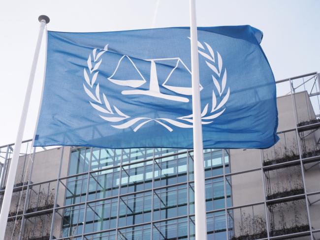 The Hague, Netherlands - March 27, 2016: The flag of the International Criminal Court at the new 2015 opened ICC building.
